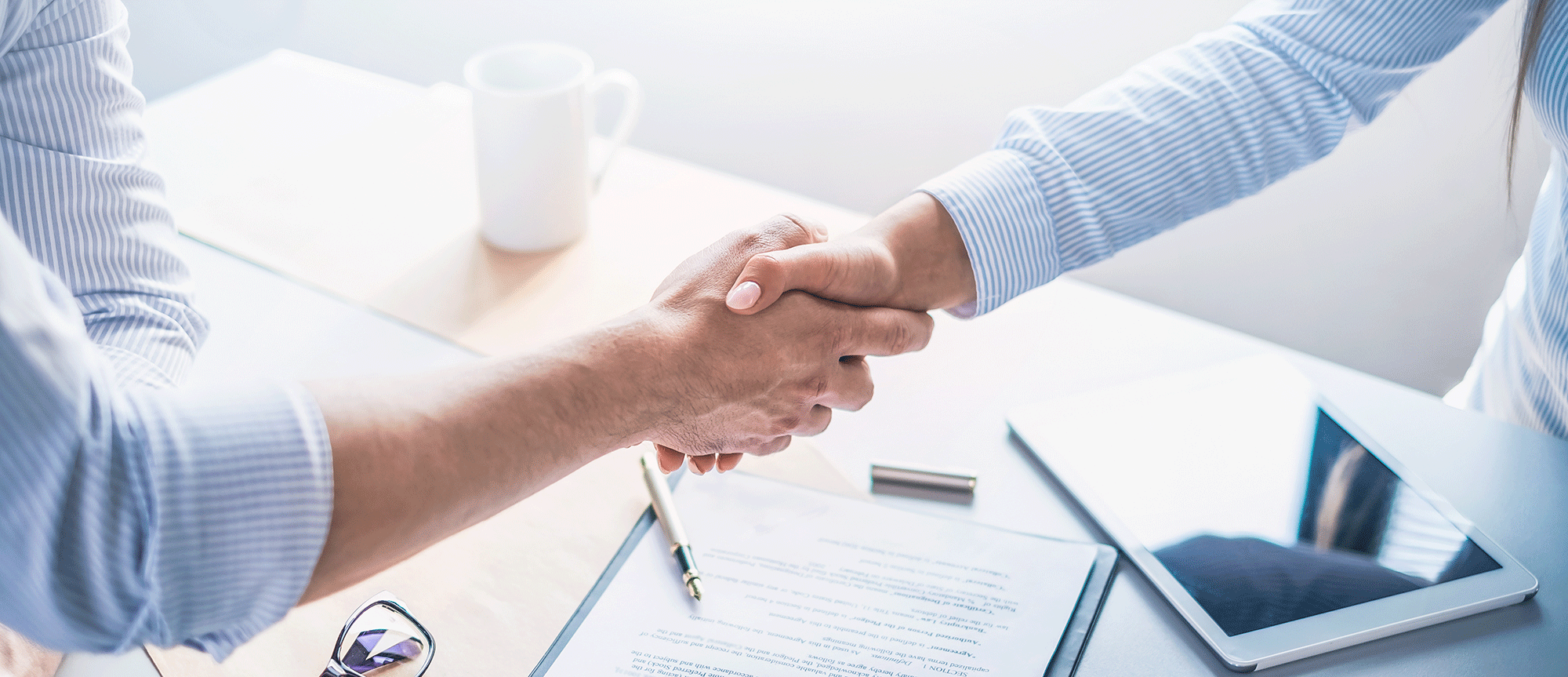 A handshake over a signed document